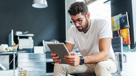 Man Watching Tablet 