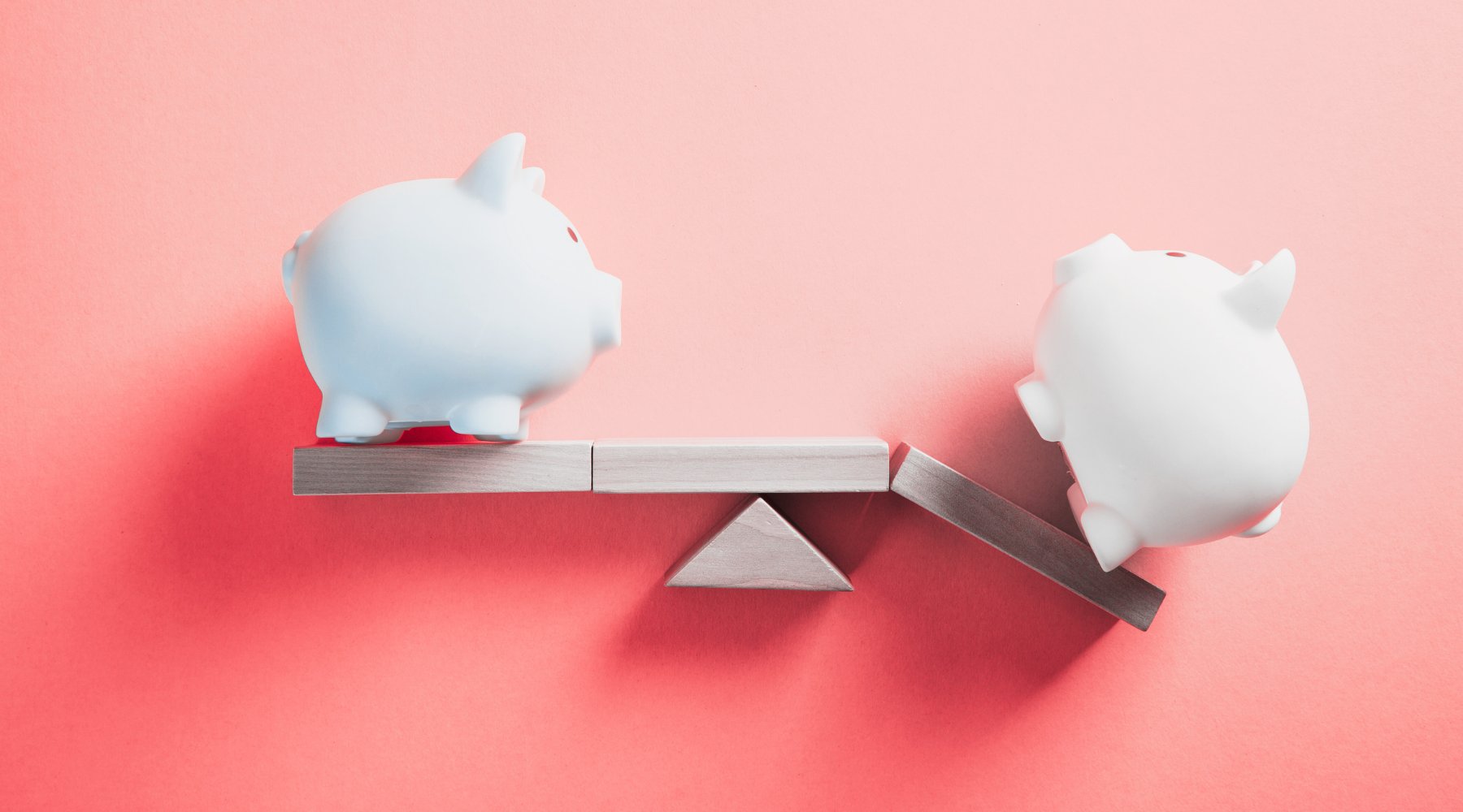 Piggy bank falling off scale. Bank accounts for bad credit.
